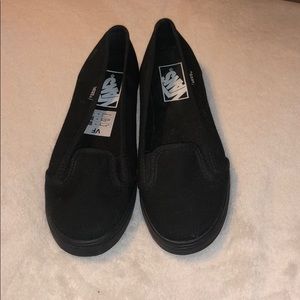 Vans slip on sneakers